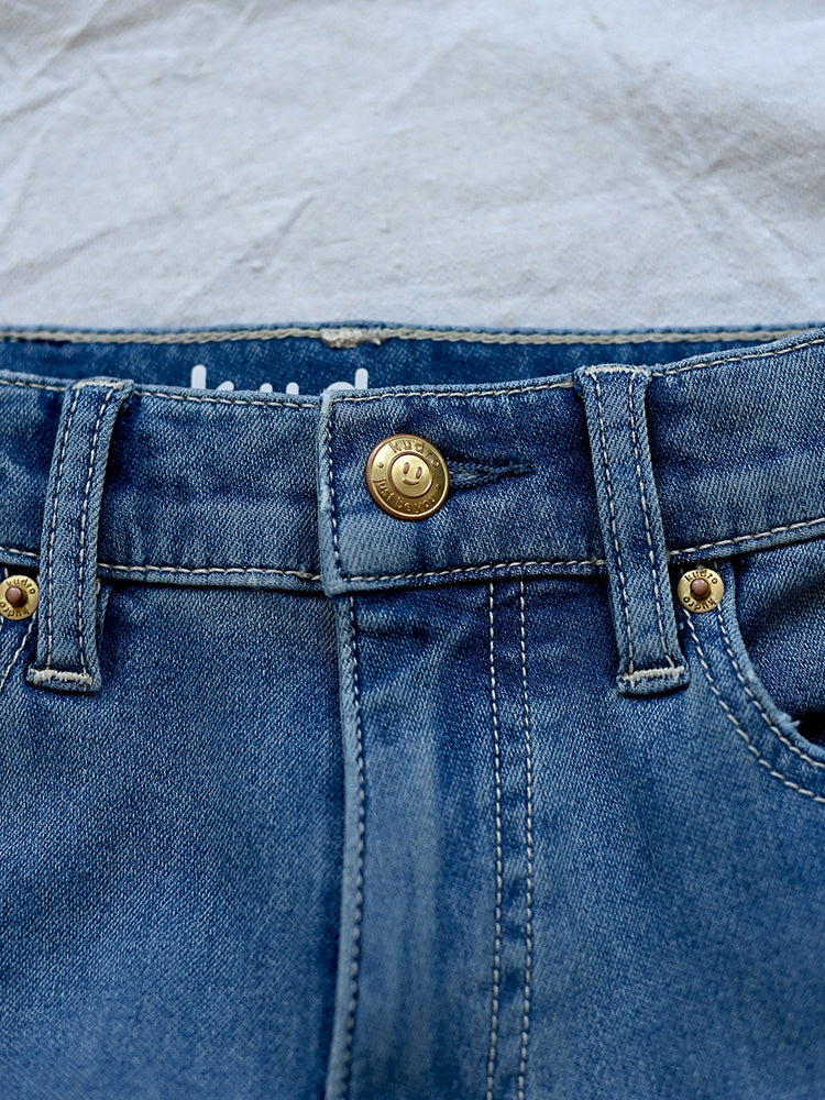 Kudro Kids The Utility Straight leg denim jeans up close image of high quality stitching and button closure