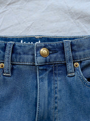 Kudro Kids The Utility Straight leg denim jeans up close image of high quality stitching and button closure
