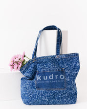 The Tote Kudro Kids tote bag made from sustainable denim with pink flowers
