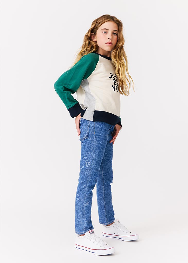 kudro kids wotto skinny jean with graphic ddodle print on girl  model