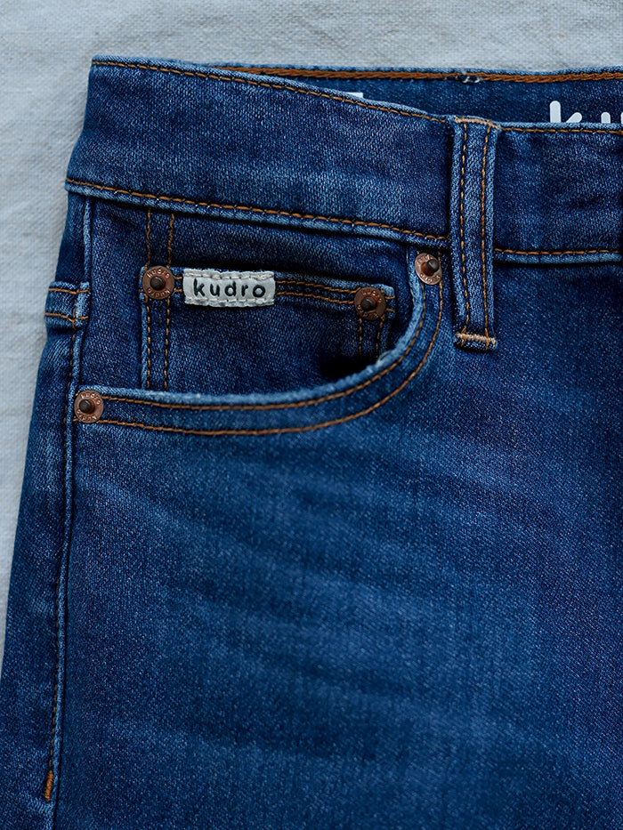 Kudro Kids The Destroy Skinny leg denim jeans close up image of high quality stitching and design