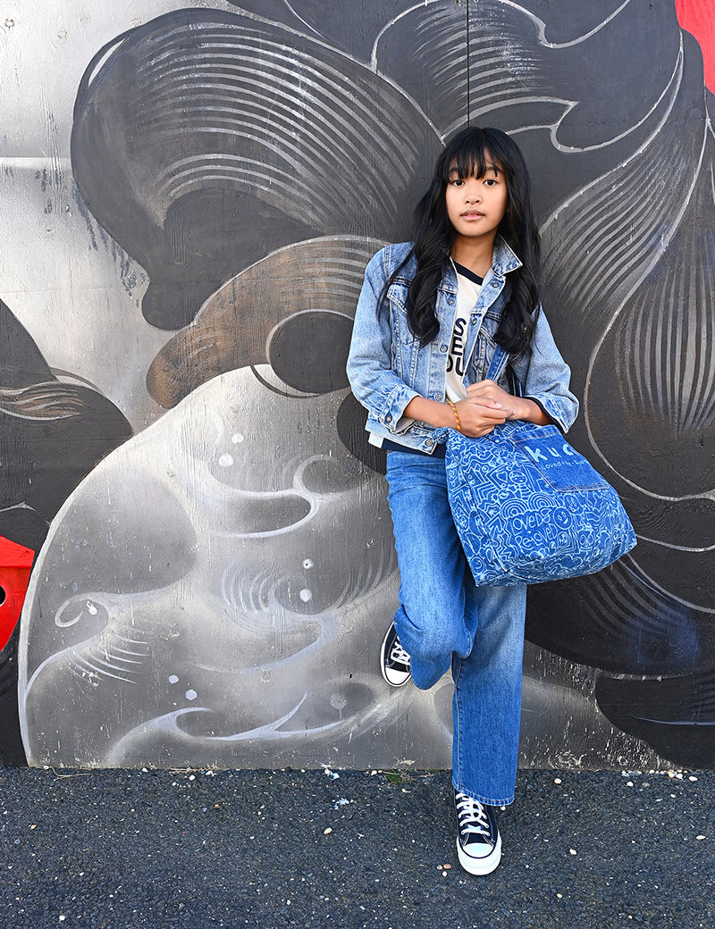 The Tote Kudro Kids tote bag made from sustainable denim model shoot with outfit