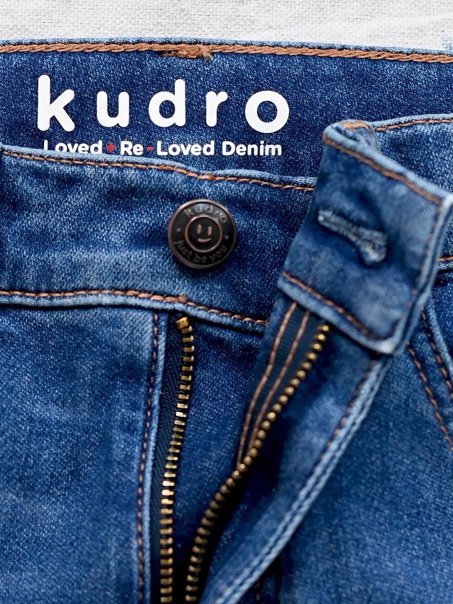 The Repair Skinny Jeans inner zip and button closure