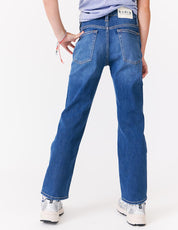 kudro kids destroy straight jean modeled by girl back view showing bk pkts and patch