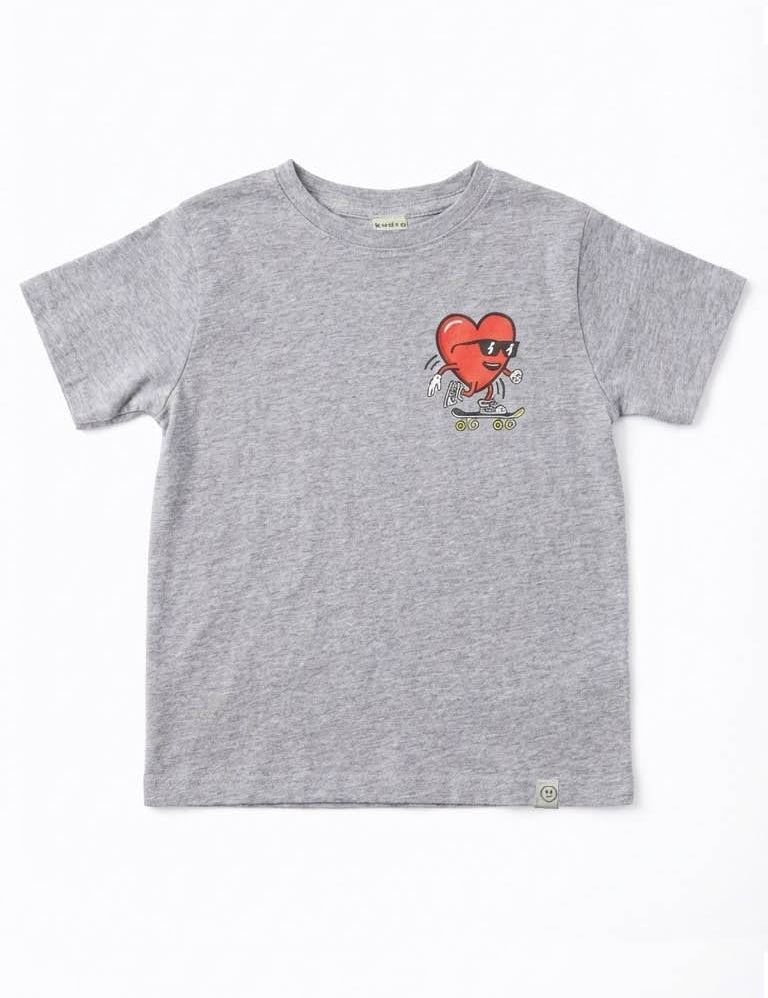 Gray t-shirt with a red heart graphic wearing sunglasses and riding a skateboard on a white background