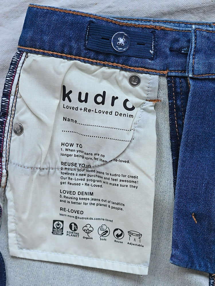 The Repair Skinny Jeans inner label with wash and care instructions