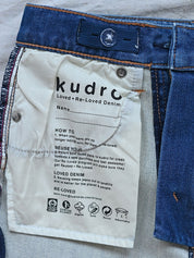 The Repair Skinny Jeans inner label with wash and care instructions